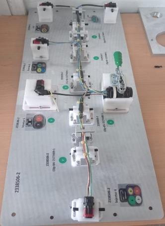 Planche de montage de câbles réalisée par ESIATECH